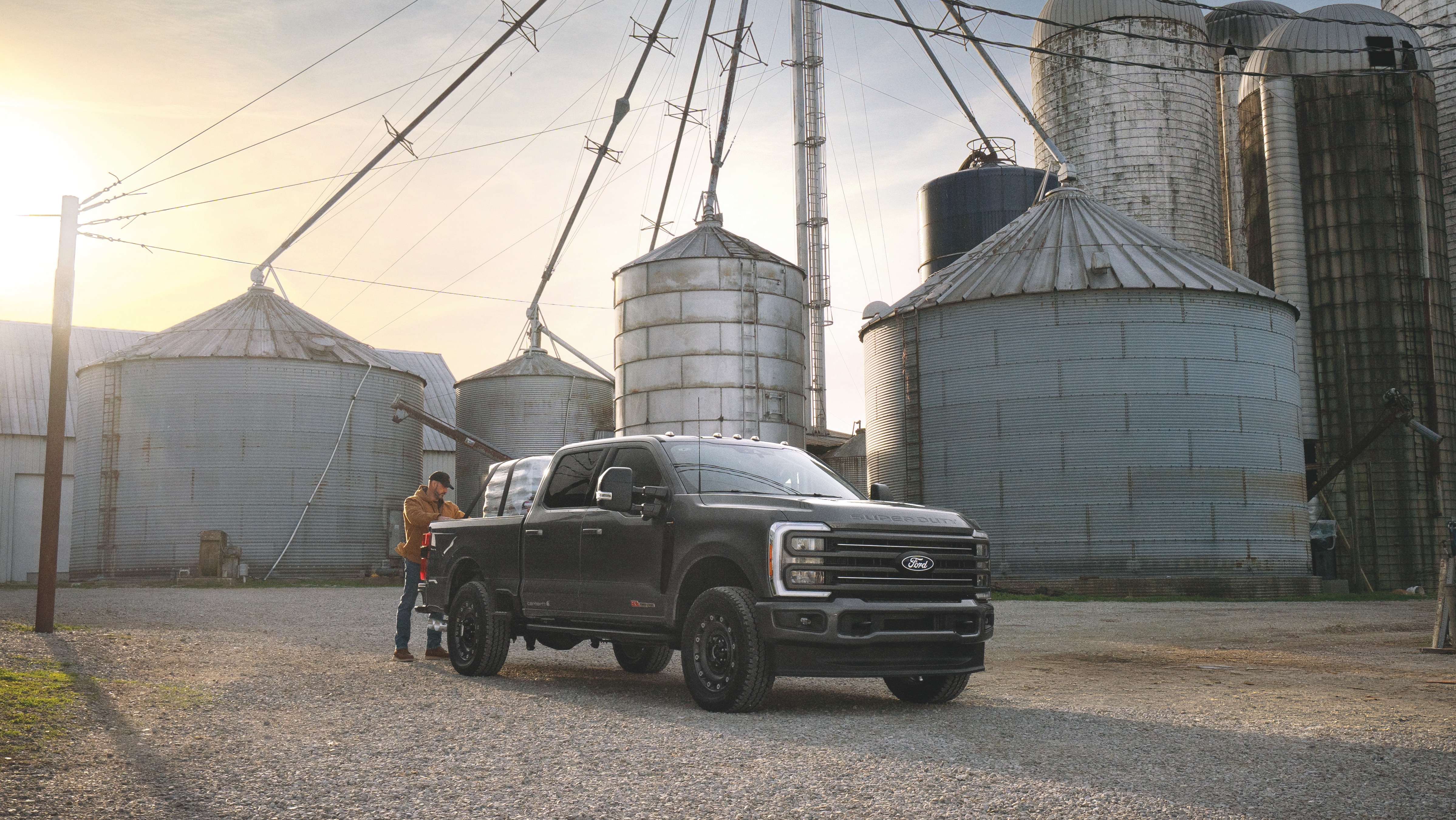 Preproduction model shown. Actual production vehicle may vary. Available Fall 2026. 2027 Ford Super Duty® F-250® XLT model with available Super Duty Carhartt® Package, optional equipment, and extra cost-color option shown.
